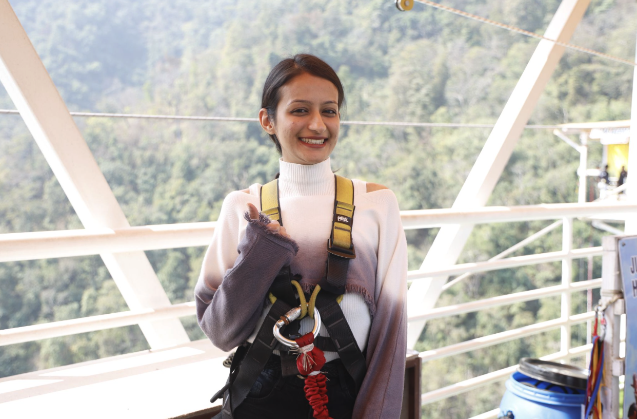 Young participant standing at a bungee jumping site in Rishikesh